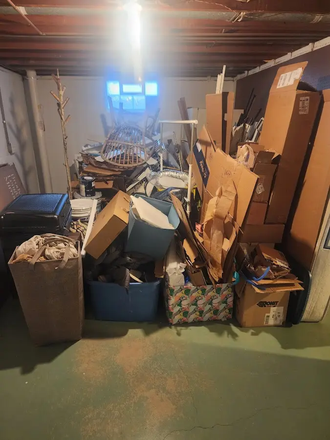 Roll-off dumpster container at job site for Yard Waste Dumpster Rental in Christiana